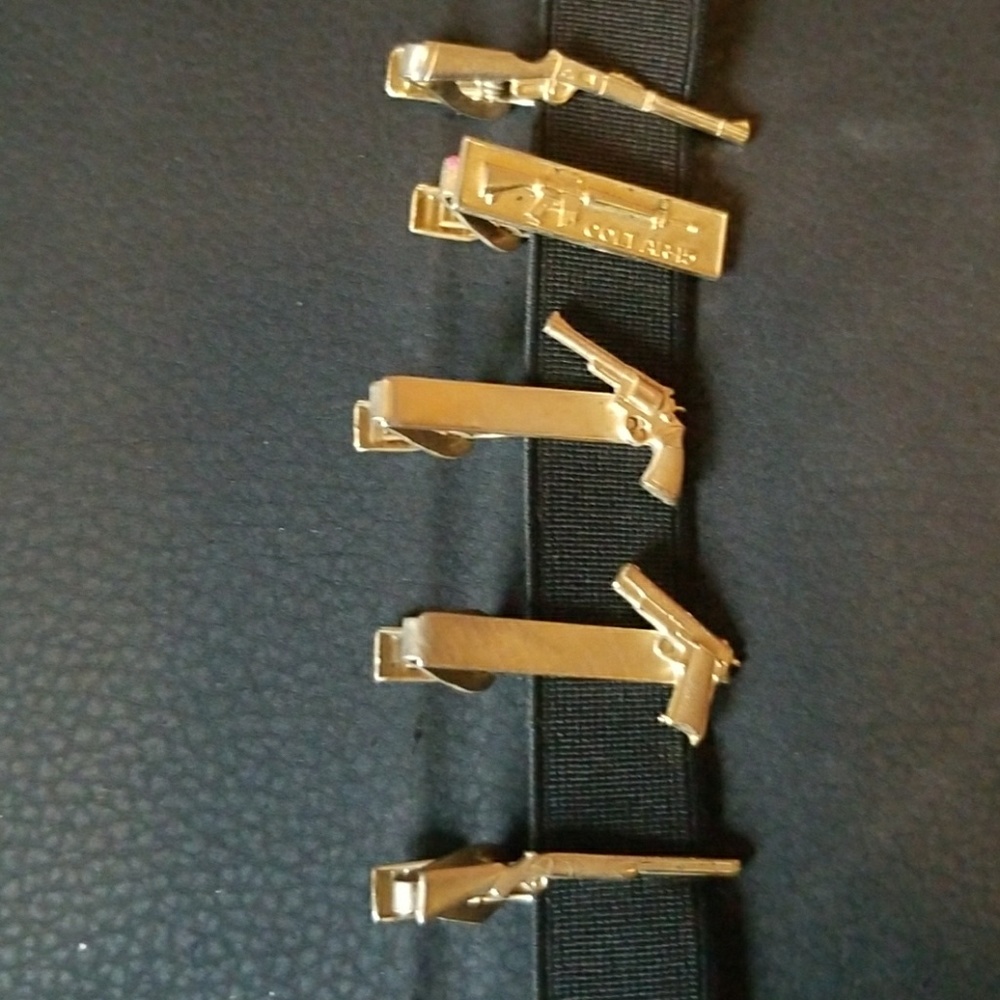 Set of 5 tie clips.not sure if gold or brass.
